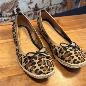 Leopard Print Ballet Flats with Bows on the top.